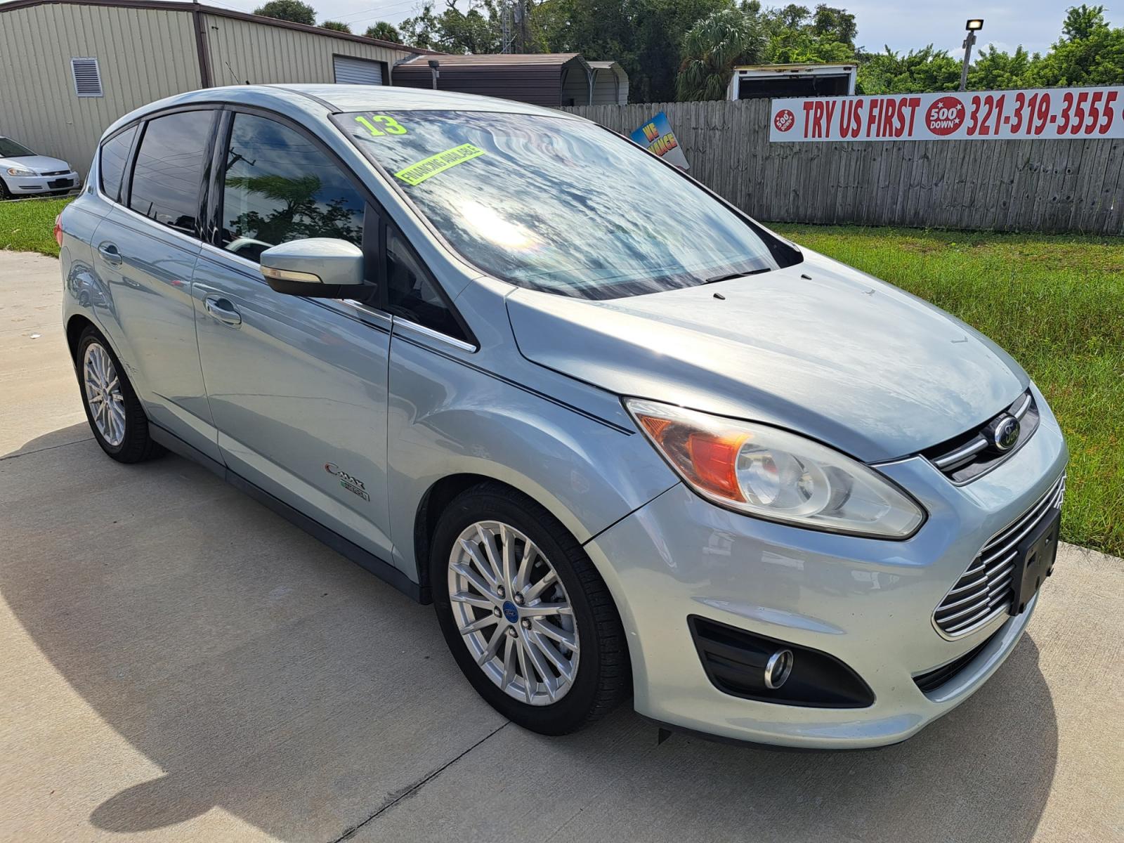 2013 Silver Ford C-Max Hybrid SEL (1FADP5CU3DL) with an 2.0L L4 DOHC 16V HYBRID engine, Continuously Variable Transmission transmission, located at 1181 Aurora Rd, Melbourne, FL, 32935, (321) 241-1100, 28.132914, -80.639175 - Photo #2